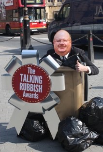 A Friends of the Earth campaigner dressed up as Eric Pickles to receive the 'Talking Rubbish' award